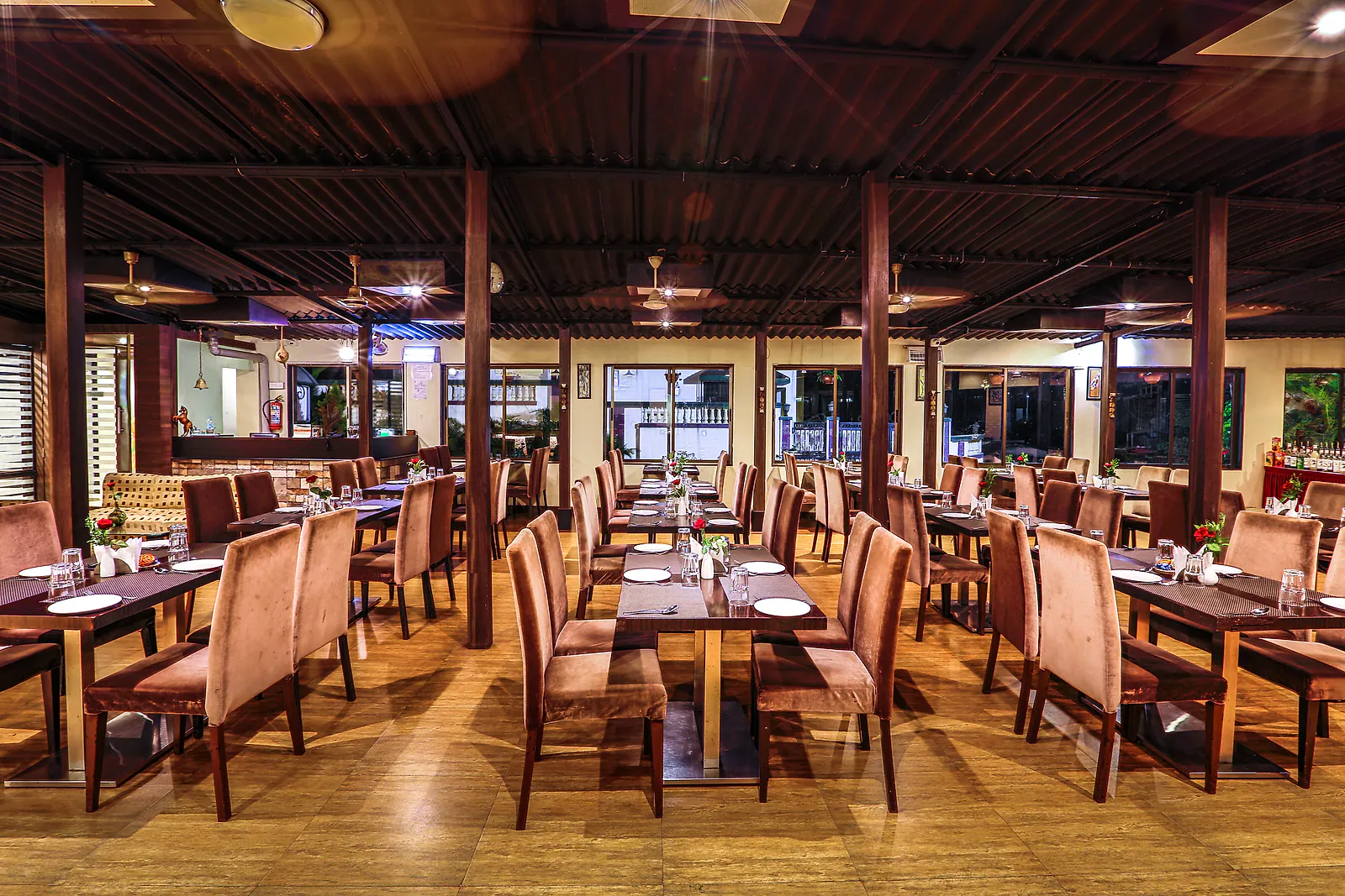 7 Heaven Restaurant at Cloud 9 Hills Resort — warm interior with mountain-facing seating