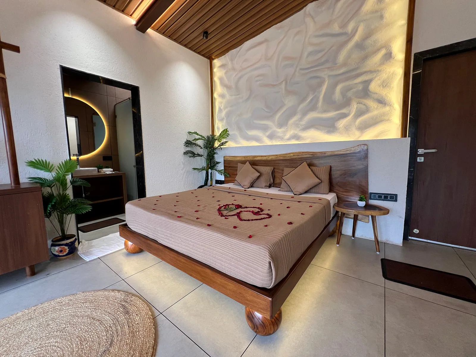 Premium Suite bedroom with rose petal decoration